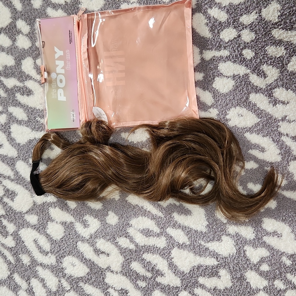 Insert name Here ponytail hair extension.
